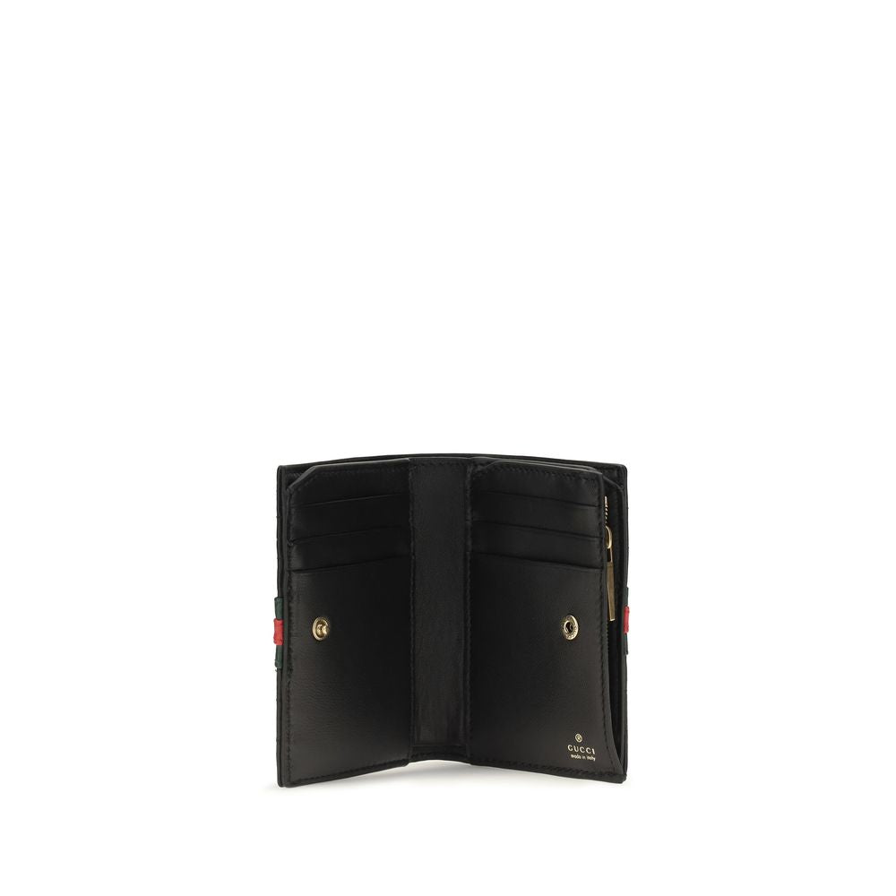 Wallet by Gucci for women in bos taurus calf leather black, signature & striped features a sleek silhouette, showcasing the sleek Gg Marmont Bos Taurus Calf Leather Wallet design with sophisticated compact-design for a premium look.