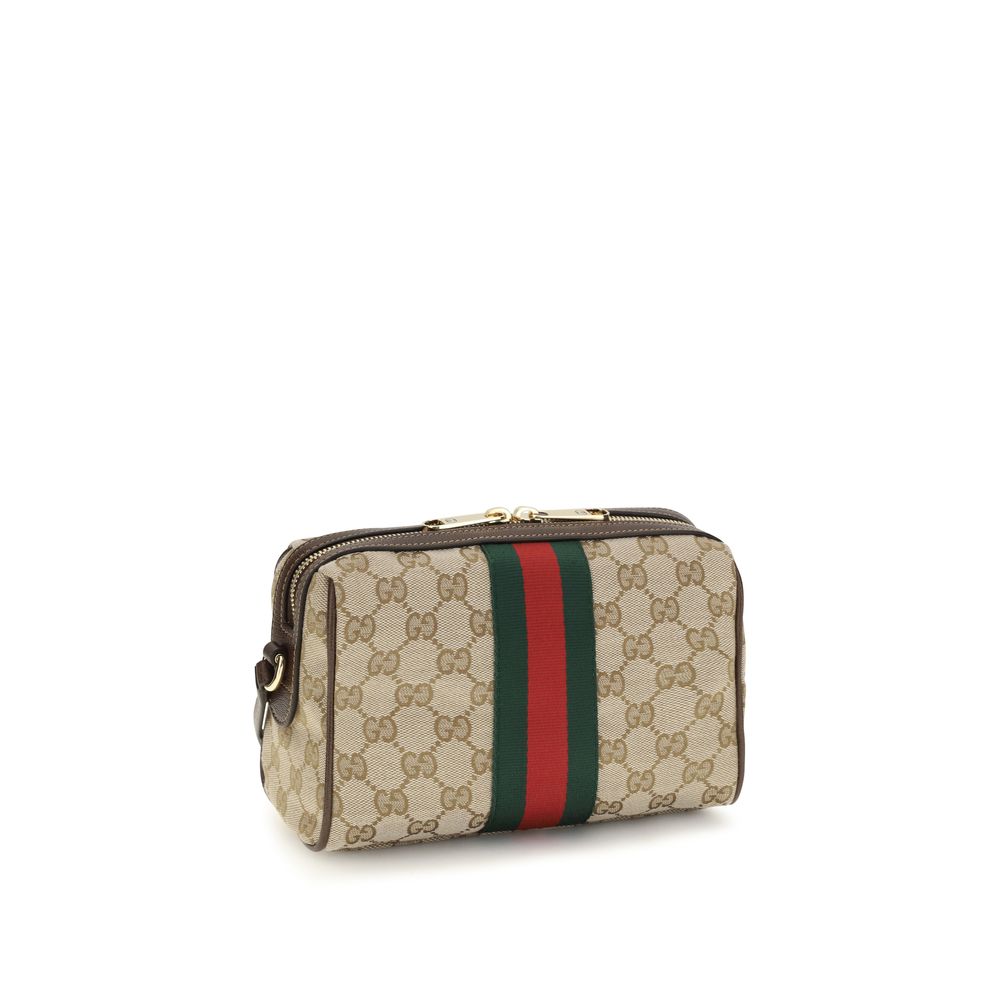 Compact Shoulder Camera Bag by Gucci for women in leather & canvas beige, brown, gold, patterned, signature & striped features a enviable silhouette, showcasing a secure zipper, ample , and enviable shoulder-strap & adjustable-strap for a enviable finish.
