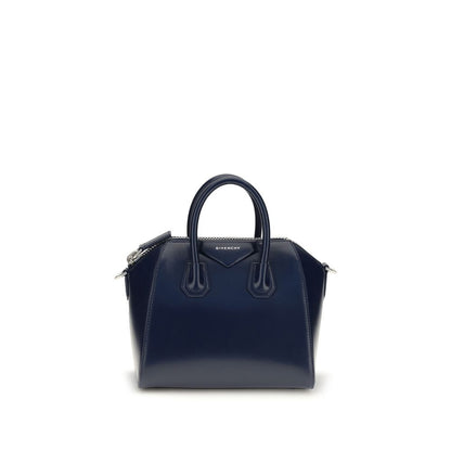 Mini Crossbody Handbag by Givenchy for women in bos taurus calf leather blue, silver & signature features a signature silhouette, showcasing a secure zipper and signature with versatile crossbody-strap, adjustable-strap & handle for a sophisticated look.