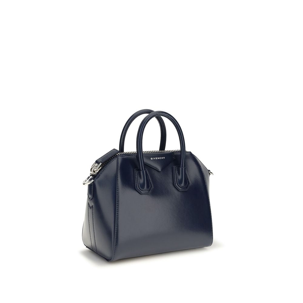 Mini Crossbody Handbag by Givenchy for women in bos taurus calf leather blue, silver & signature features a contemporary silhouette, showcasing a secure zipper, ample , and contemporary crossbody-strap, adjustable-strap & handle for a sophisticated look.