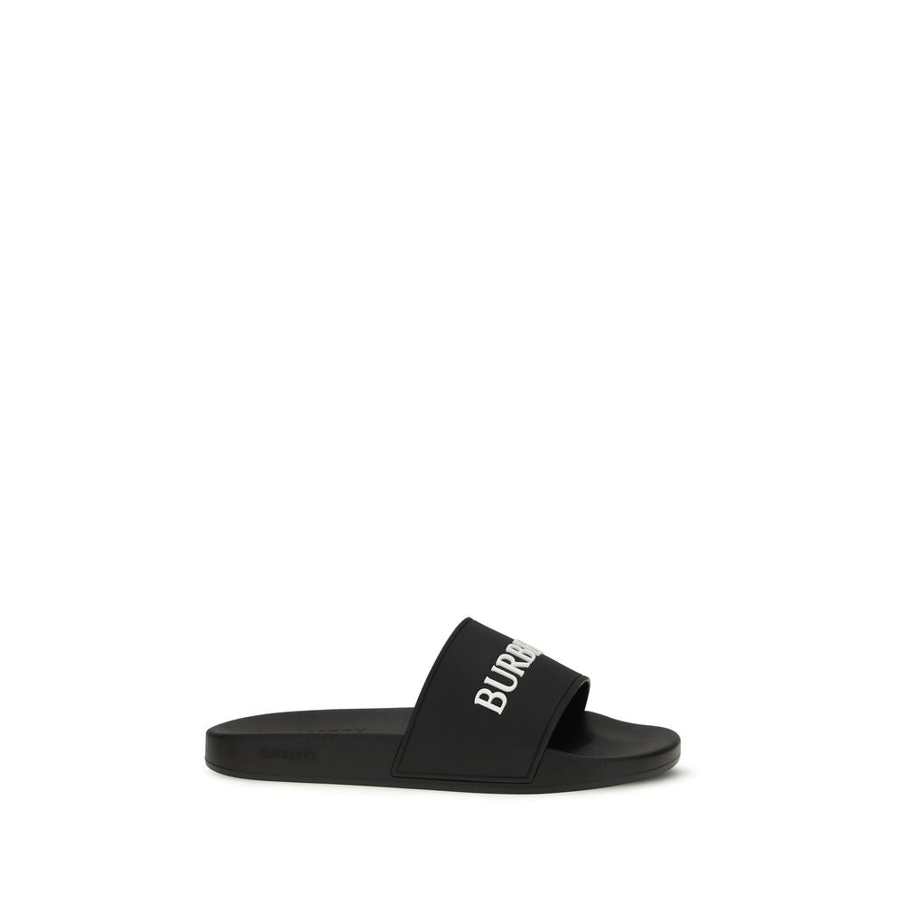 Sandals by Burberry for women in rubber black showcases a sculptural silhouette as Women's Rubber Sandals, defined by a sculptural and sculptural for a sculptural look.