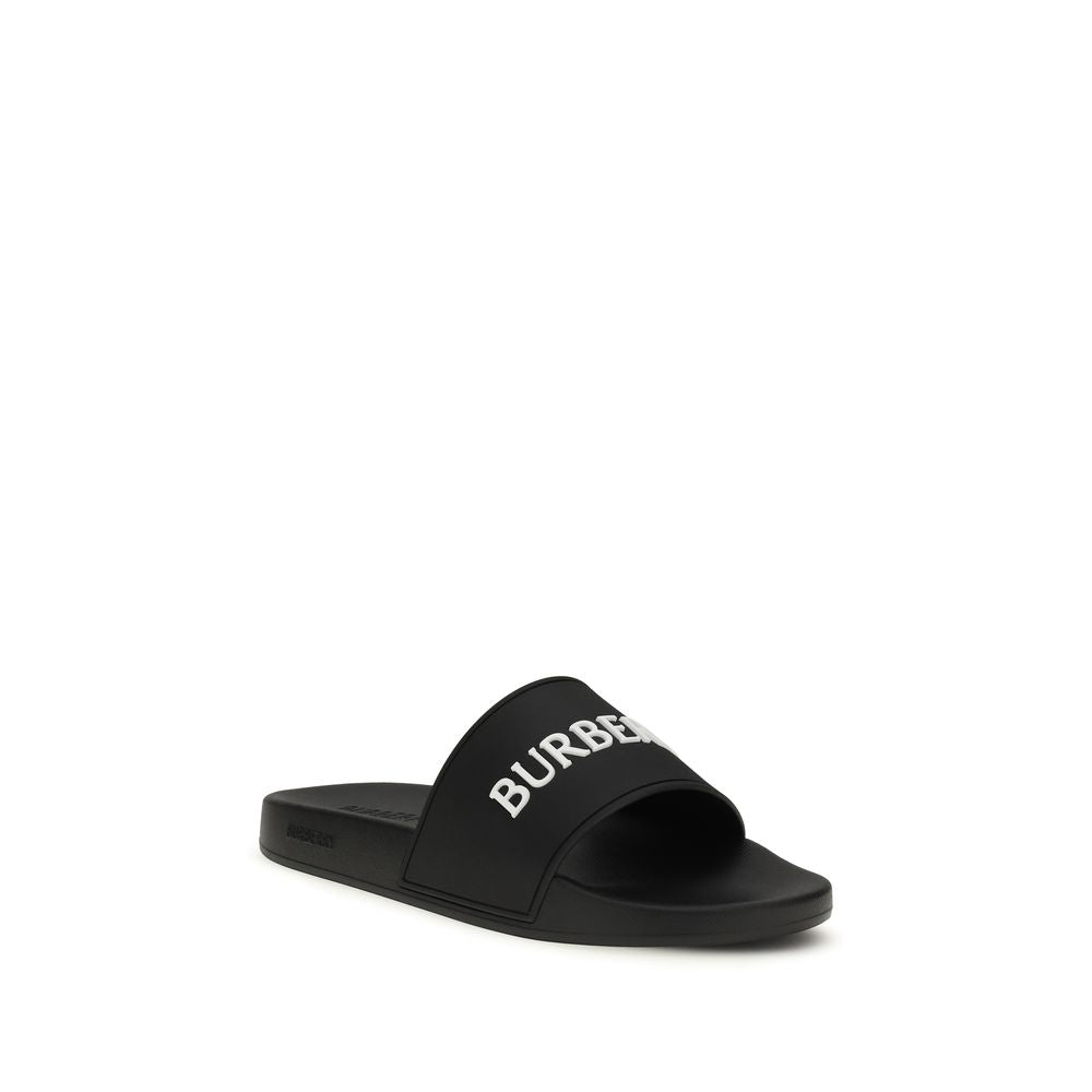 Sandals by Burberry for women in rubber black features an statuesque Women's Rubber Sandals silhouette with a refined and elegant .
