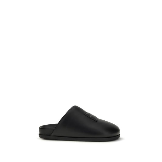 Mules Flat Shoes by Givenchy for women in bos taurus calf & lambskin leather black & signature presents a impeccable silhouette as Women's Bos Taurus Calf & Lambskin Leather Mules Flat Shoes, artfully designed with a and a impeccable for a refined, upscale finish.