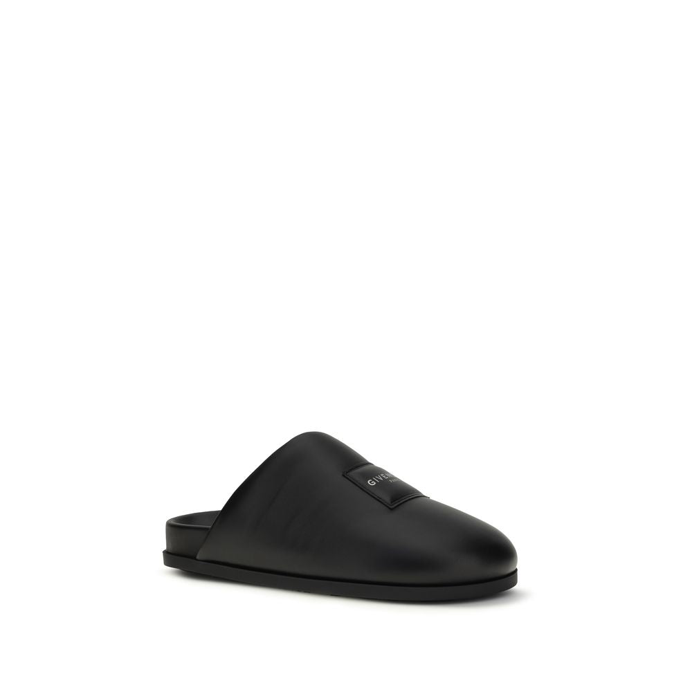 Mules Flat Shoes by Givenchy for women in bos taurus calf & lambskin leather black & signature features an captivating silhouette, showcasing the captivating style of the Women's Bos Taurus Calf & Lambskin Leather Mules Flat Shoes with its distinct and refined .