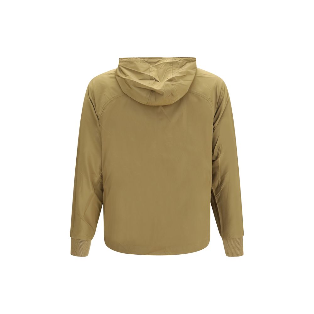 Hooded Windbreaker Jacket by C.P. Company for men in merino wool nylon & polyamide beige showcases a urban chic silhouette, detailed with a urban chic hooded neckline and functional pockets, hooded & windproof for a polished finish.
