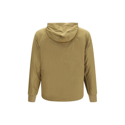 Hooded Windbreaker Jacket by C.P. Company for men in merino wool nylon & polyamide beige showcases a urban chic silhouette, detailed with a urban chic hooded neckline and functional pockets, hooded & windproof for a polished finish.