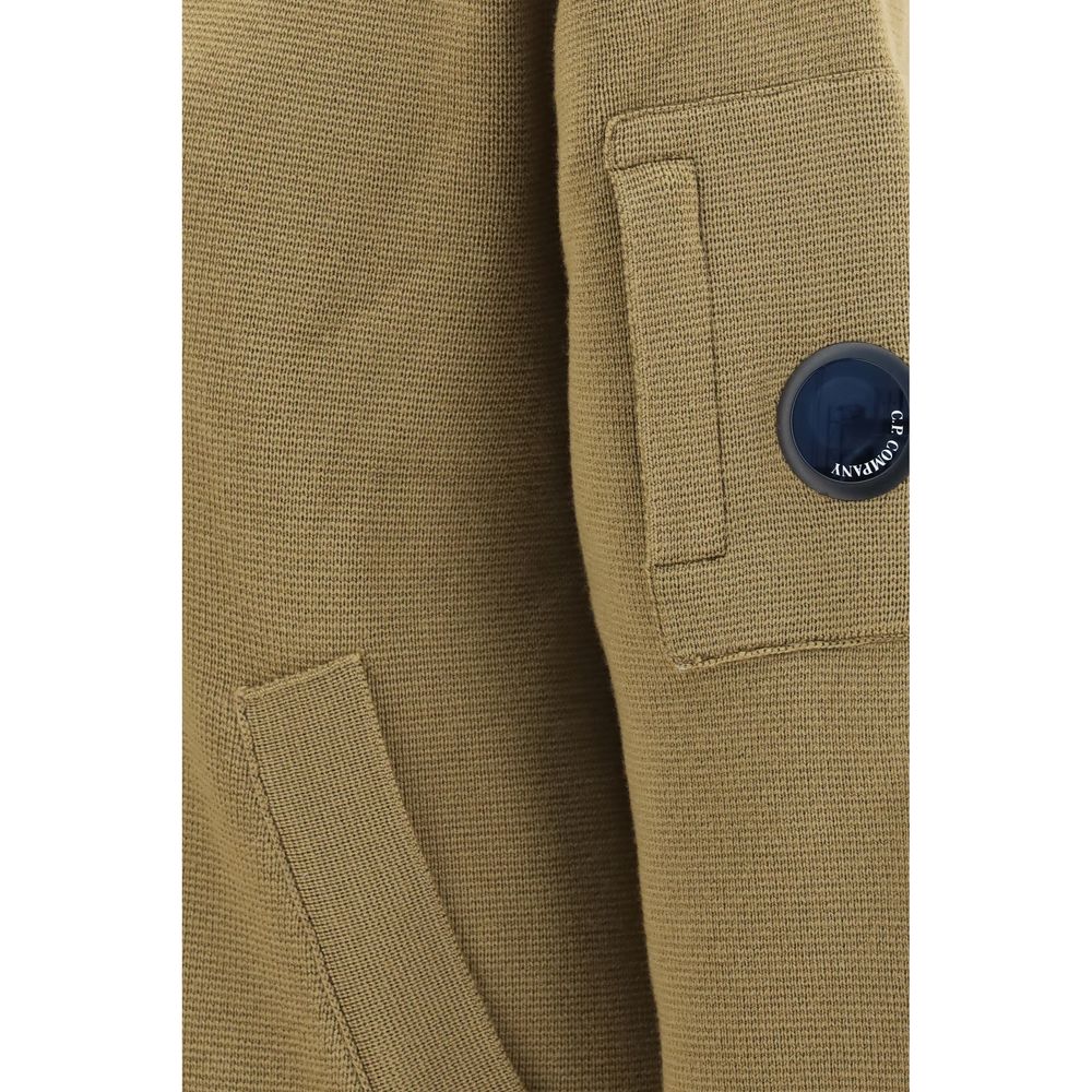 Hooded Windbreaker Jacket by C.P. Company for men in merino wool nylon & polyamide beige features an stylish silhouette, showcasing a sophisticated hooded neckline and performance-driven pockets, hooded & windproof for a premium, stylish look.