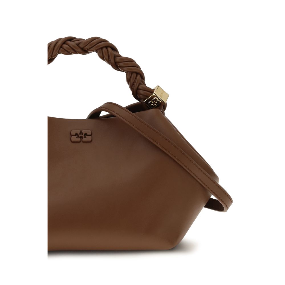 Small Shoulder Bag by Ganni for women in polyester polyurethane leather brown features a effortless sophistication silhouette, secured by a magnetic with ample built-in-compartments and versatile shoulder-strap & adjustable-strap for a effortless sophistication finish.