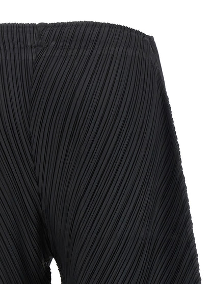 PLEATS PLEASE ISSEY MIYAKE Black Polyester Casual Pants