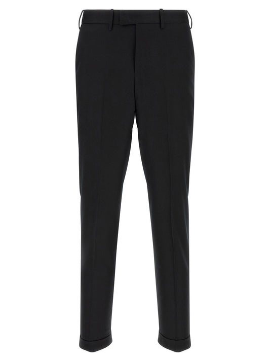 Trousers by PT Torino for men in virgin wool black features an on trend silhouette, showcasing a sophisticated regular-fit & slim with a long and for an on trend finish.