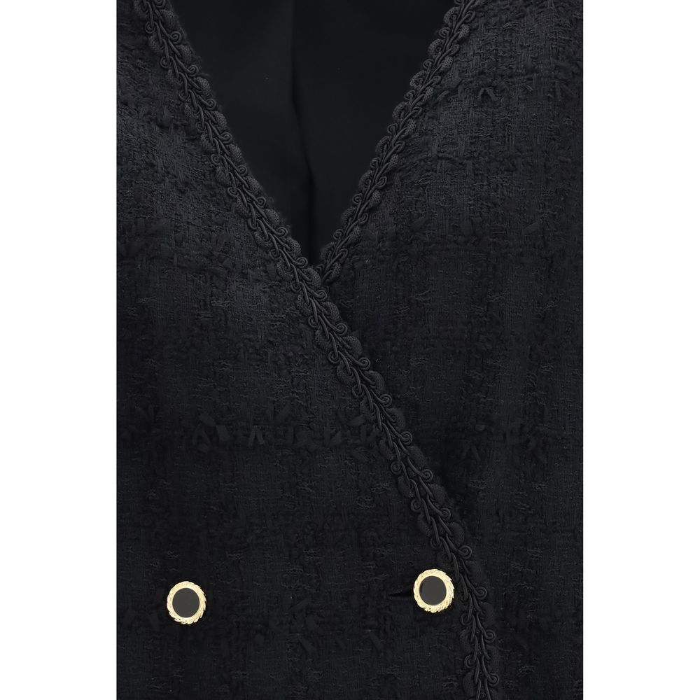 Overcoat by Alessandra Rich for women in cotton tweed linen & acrylic black, patterned & checked features a contemporary silhouette showcasing a contemporary and refined for a sophisticated finish.