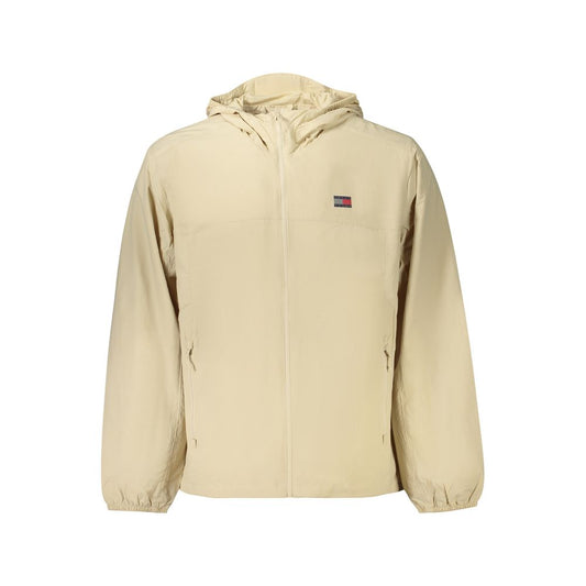 Hooded Windbreaker Jacket by Tommy Hilfiger for men in polyamide beige features an perennial silhouette with a refined hooded neckline and perennial pockets, hooded & windproof for a sophisticated weather-resistant look.