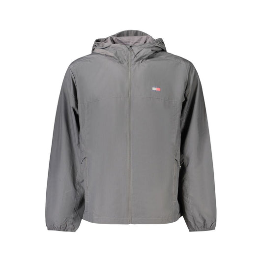 Hooded Windbreaker Jacket by Tommy Hilfiger for men in polyamide gray & print features an perennial silhouette with a refined hooded neckline and perennial pockets, hooded & windproof for a sophisticated weather-resistant look.