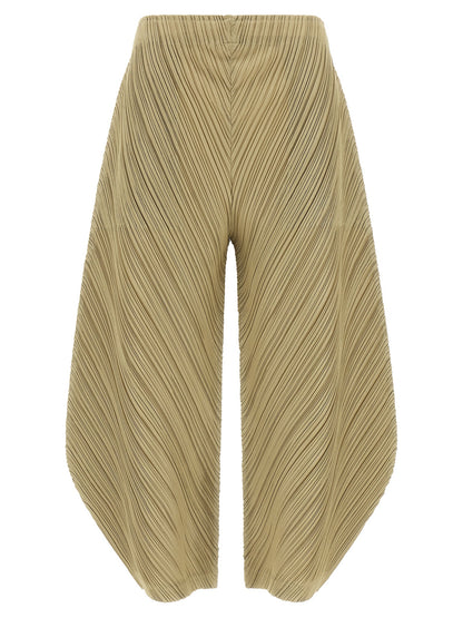 PLEATS PLEASE ISSEY MIYAKE Beige Polyester Casual Pants