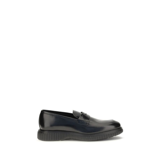 Loafer Slip-On Shoes by Ferragamo for men in bos taurus calfskin leather black & signature showcases a timeless silhouette from the Gancini Men's Bos Taurus Calfskin Leather Loafer Slip-On Shoes collection, featuring a timeless and for a timeless finish.