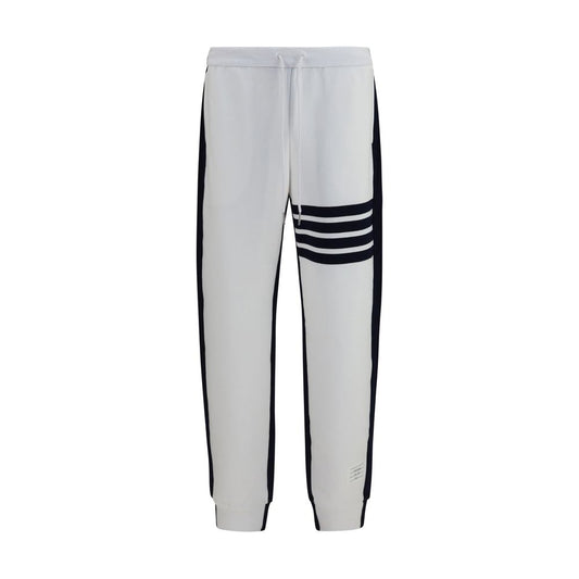 Pants by Thom Browne for men in cotton multicolor, signature & striped features a sleek silhouette with a sleek relaxed-fit & regular-fit, a refined long, and a sophisticated finish.