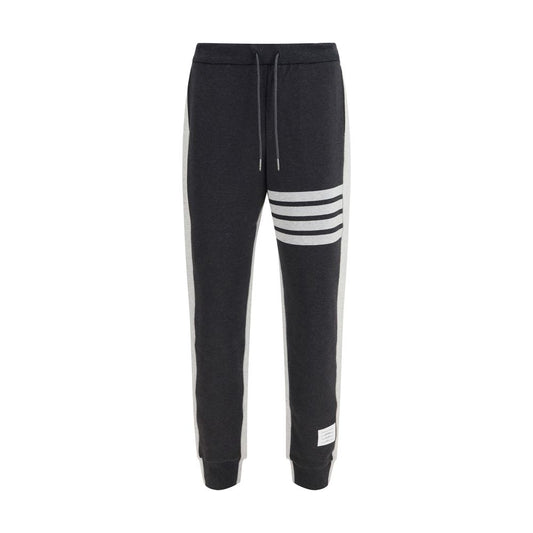Pants by Thom Browne for men in cotton gray, signature & striped features an on trend silhouette with a and relaxed-fit & regular-fit cut in an elegant long for a sophisticated look.