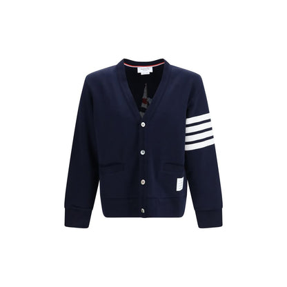 Cardigan by Thom Browne for men in cotton blue, white, signature & striped features an crisp silhouette, showcasing a sophisticated v-neck boat neckline and detail for a truly crisp finish.