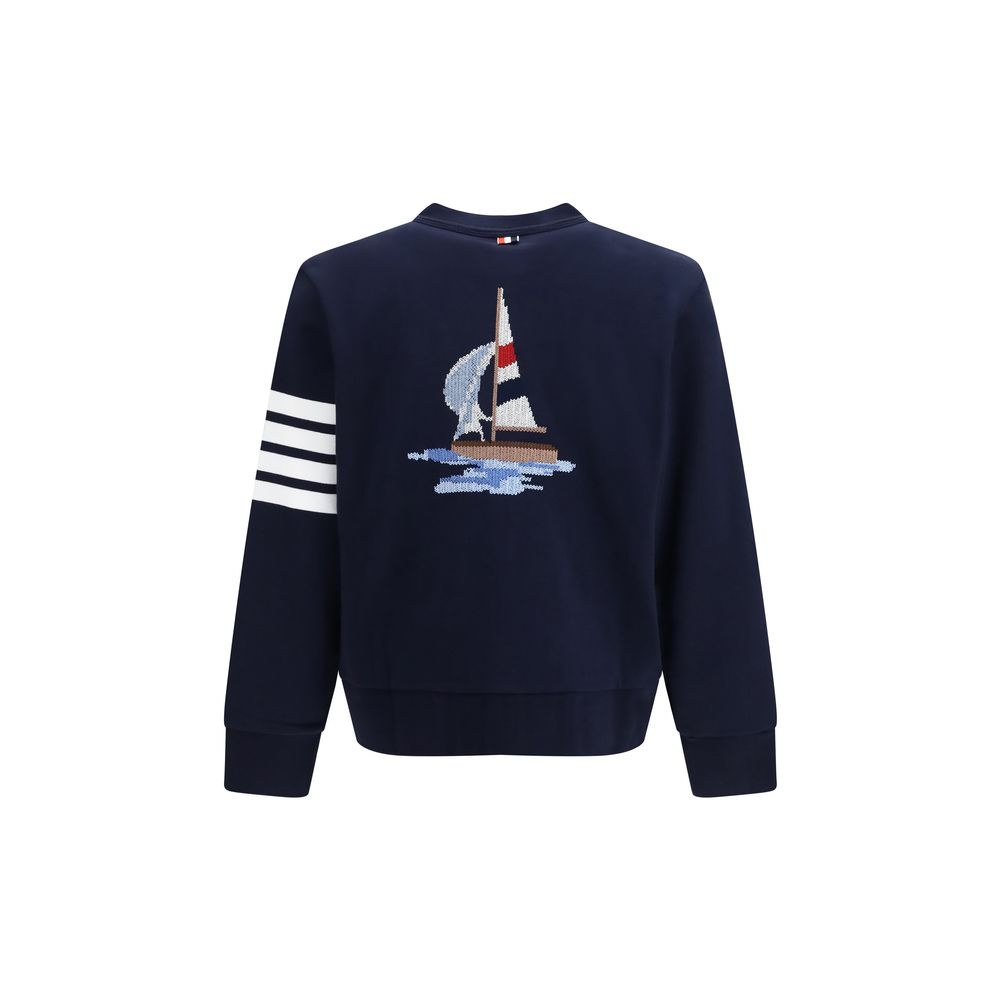 Cardigan by Thom Browne for men in cotton blue, white, signature & striped features a dramatic silhouette, showcasing a sophisticated v-neck boat neckline and dramatic detail for a timeless, premium look.