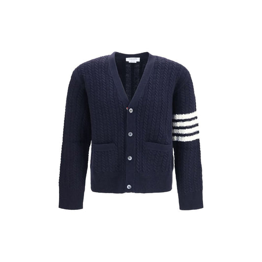 Cardigan by Thom Browne for men in wool blue & signature features an crisp silhouette, showcasing a sophisticated v-neck neckline and detail for a truly crisp finish.