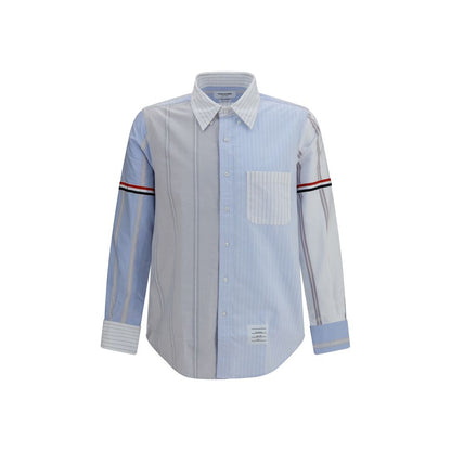 Shirt by Thom Browne for men in cotton blue, patterned, pinstripe, signature & striped features an architectural silhouette with a refined long-sleeve and elegant button-down-collar neckline for a architectural look.