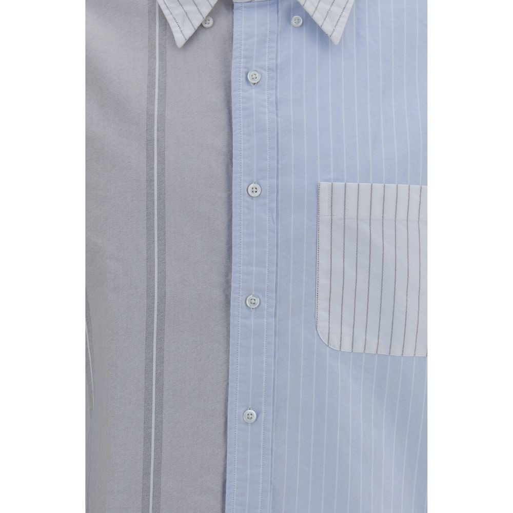 Shirt by Thom Browne for men in cotton blue, patterned, pinstripe, signature & striped showcases a sharp silhouette, elegantly detailed with a sharp and sharp .