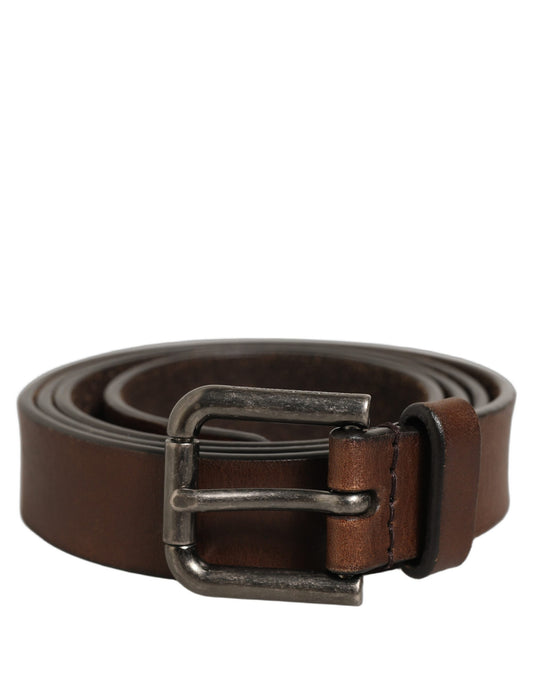Belt by Dolce & Gabbana for men in leather & metal brown & silver features an artisanal finish, elegantly showcasing the signature style and artisanal craftsmanship of the Leather & Metal Belt design.