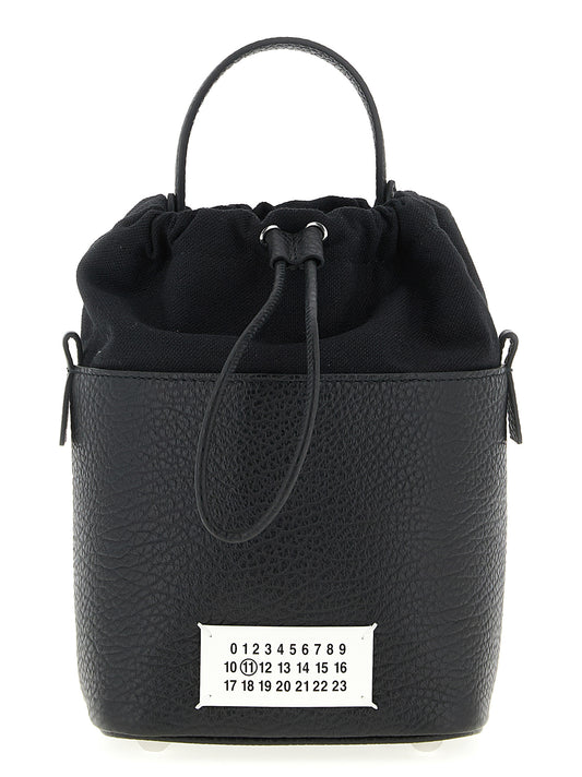 Crossbody Bucket Handbag by Maison Margiela for women in calfskin leather black features an multi-faceted design with a secure drawstring, ample , and versatile crossbody-strap & shoulder-strap for a multi-faceted finish.