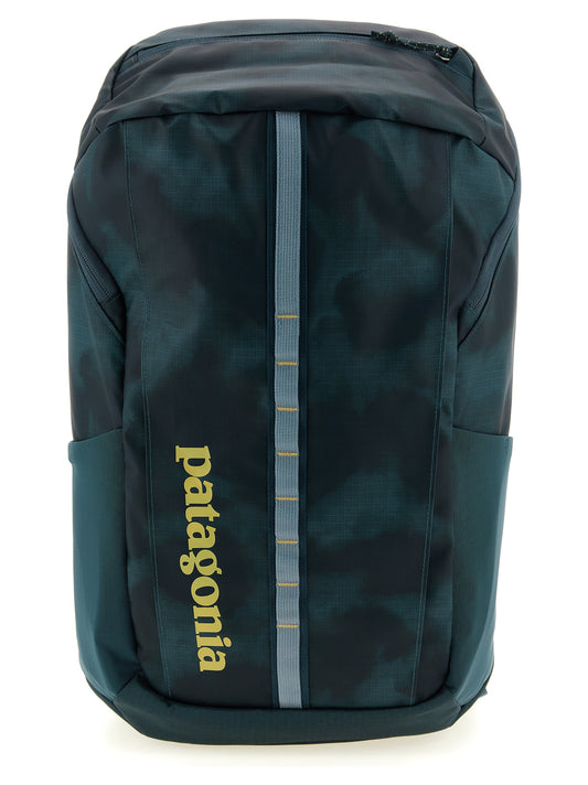 Backpack by PATAGONIA for men in tu & polyester black & blue features a fashionable silhouette, showcasing the Black Hole TU & Polyester Backpack design with a secure , ample , and versatile backpack-strap.