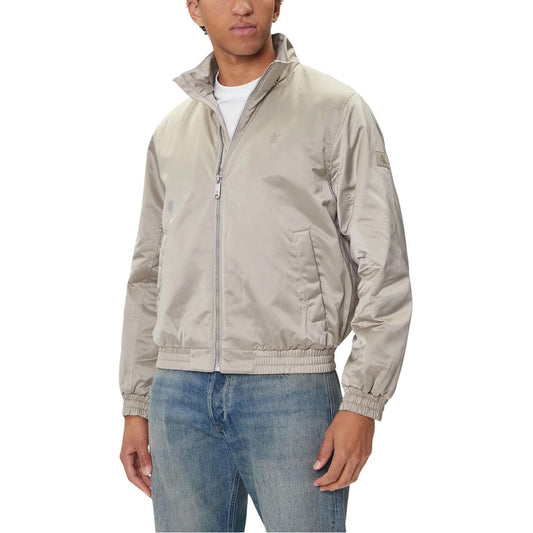 This Bomber Jacket by Calvin Klein Jeans for men in polyester beige exhibits a edgy silhouette, meticulously detailed with functional lightweight & insulated and a edgy for a edgy finish.