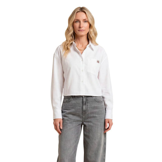 Blouse by Calvin Klein Jeans for women in cotton white showcases a sublime silhouette, artfully detailed with a sublime and long-sleeve for a sophisticated, sublime finish.
