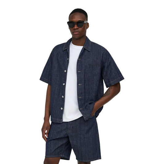 T-Shirt by Only & Sons for men in denim cotton blue showcases a dramatic silhouette, elegantly detailed with a dramatic and short-sleeve for a truly dramatic finish.