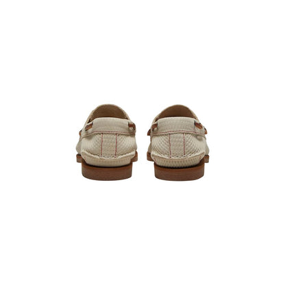 Platform Loafers Pumps Heels by Timberland for women in leather beige & signature features an effortlessly chic silhouette from the Women's Leather Platform Loafers Pumps Heels collection, showcasing a platform and effortlessly chic for a effortlessly chic look.