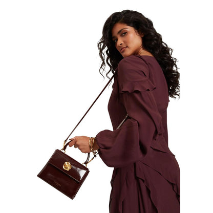 Mini Shoulder Tote Handbag by Ted Baker for women in polyurethane gold, purple, rose & signature features a exquisite silhouette, showcasing a secure magnetic & clasp and exquisite with versatile shoulder-strap, handle & adjustable-strap for a exquisite finish.