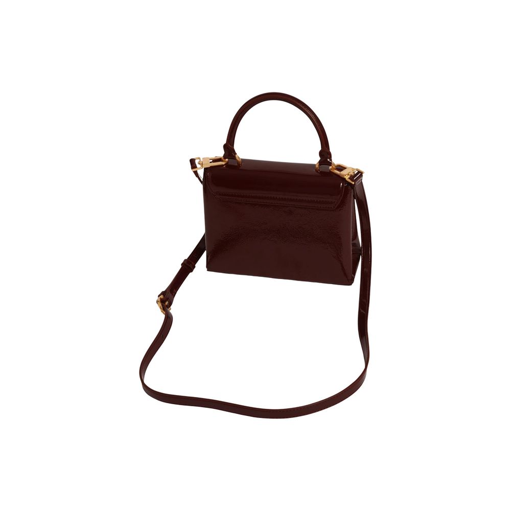 Mini Shoulder Tote Handbag by Ted Baker for women in polyurethane gold, purple, rose & signature features a contemporary silhouette, showcasing a secure magnetic & clasp, ample , and contemporary shoulder-strap, handle & adjustable-strap for a sophisticated look.