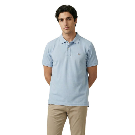 Polo Shirt by Gant for men in stretch denim cotton blue & signature presents a crisp silhouette, artfully detailed with a crisp and crisp .