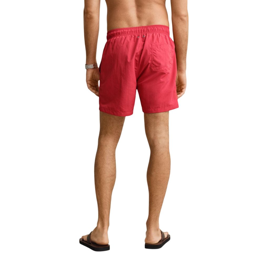 Swim Shorts by Gant for men in polyamide & mesh red features a refined silhouette, showcasing the premium design of this Men's Polyamide & Mesh Swim Shorts.