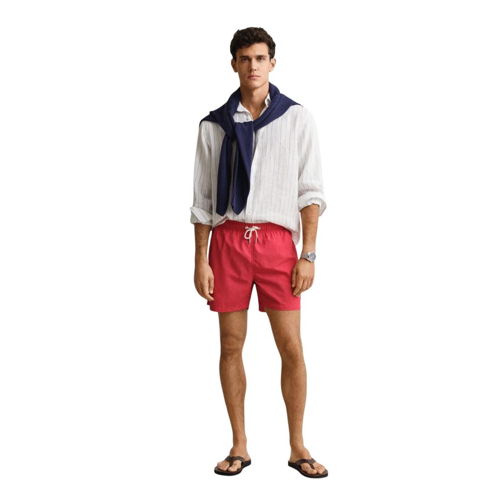 Swim Shorts by Gant for men in polyamide & mesh red showcases a contemporary silhouette, artfully capturing the essence of the contemporary Men's Polyamide & Mesh Swim Shorts design for a sophisticated look.