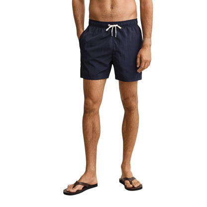 Swim Shorts by Gant for men in polyamide & mesh blue features a beach chic silhouette, showcasing the signature style of the Men's Polyamide & Mesh Swim Shorts.