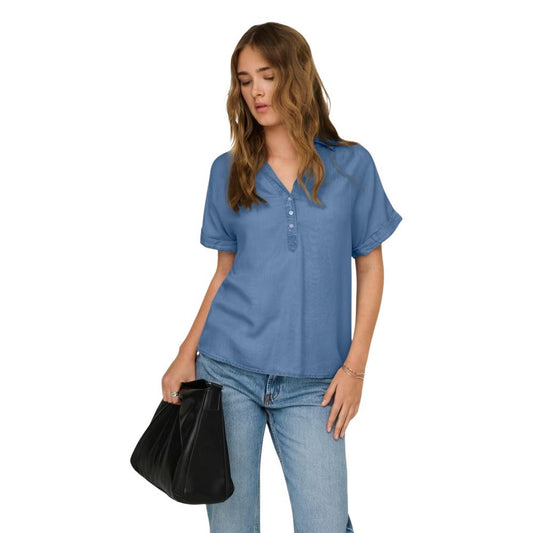 Shirt by Only for women in lyocell blue showcases a sublime silhouette, artfully detailed with a sublime v-neck neckline and cap-sleeve; short-sleeve for a sophisticated, sublime finish.