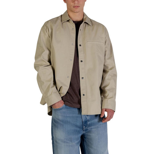 Overcoat by Calvin Klein Jeans for men in cotton beige features an satoral silhouette, showcasing a sophisticated and satoral breathable-design, lightweight & pockets for a premium, timeless look.