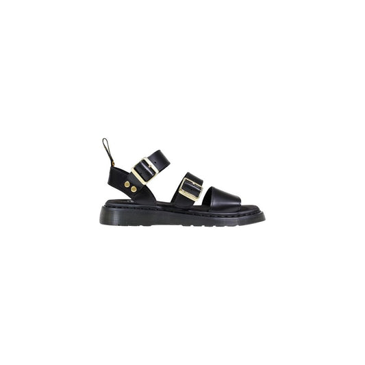 Flat Sandals by Dr. Martens for women in leather & metal and black, gold & signature presents a captivating silhouette, showcasing the signature style of the Women's Leather & Metal Flat Sandals with a captivating flat and captivating .