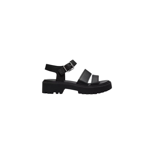 Platform Sandals by Timberland for women in leather black showcases a sculptural silhouette as Women's Leather Platform Sandals, defined by a sculptural platform and sculptural for a sculptural look.