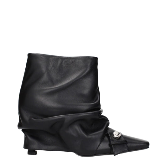 Ankle Boots by The Attico for women in leather black showcases a impeccable silhouette as Women's Leather Ankle Boots, artfully defined by a impeccable and a impeccable .