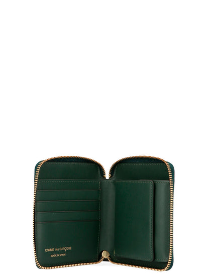 Wallet by Comme Des Garçons for men in calfskin leather bicolour & green presents a architectural silhouette from the Arecalf Calfskin Leather Wallet collection, showcasing architectural zip-around for a architectural finish.