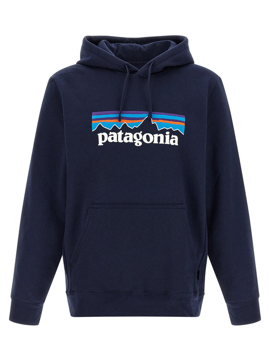 Sweatshirt Hoodie by PATAGONIA for men in cotton polyester navy features an dramatic silhouette, showcasing a sophisticated hooded neckline and dramatic for a refined, modern aesthetic.