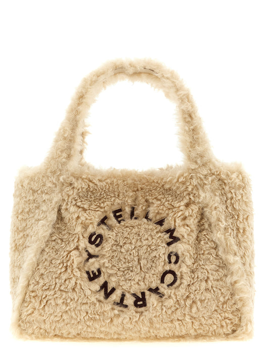 Tote Clutch Bag by Stella McCartney for women in polyester beige & gold features a urban sophisticate Polyester Tote Clutch Bag design with a secure magnetic, ample , and versatile handle & detachable-strap for a urban sophisticate finish.