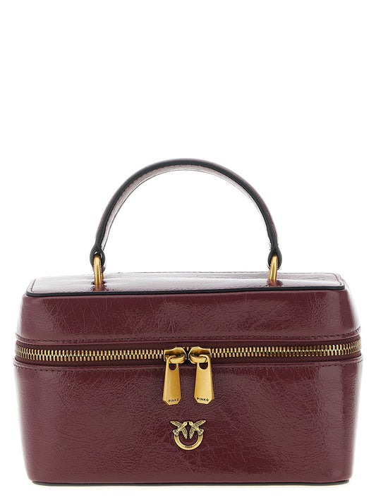 Mini Crossbody Vanity Handbag by PINKO for women in calfskin leather bordeaux & gold features a multifaceted silhouette, showcasing a secure zipper and multifaceted with versatile crossbody-strap, shoulder-strap & handle for multifaceted style.