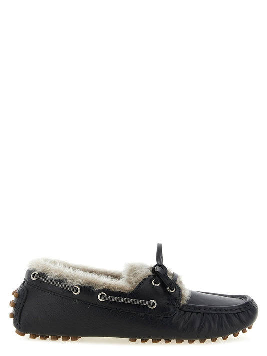 Flat Loafer Slip-On Winter Shoes by Brunello Cucinelli for women in calfskin leather plush & rubber black showcases a impeccable silhouette as Monile Women's Calfskin Leather Plush & Rubber Flat Loafer Slip-On Winter Shoes, artfully designed with a impeccable flat and refined for a impeccable finish.
