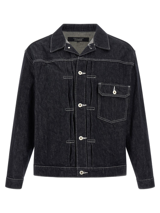 Trucker Jacket by Comme Des Garçons for men in denim cotton blue presents a effortlessly chic silhouette, showcasing a sophisticated square neckline and premium pockets for a truly effortlessly chic finish.